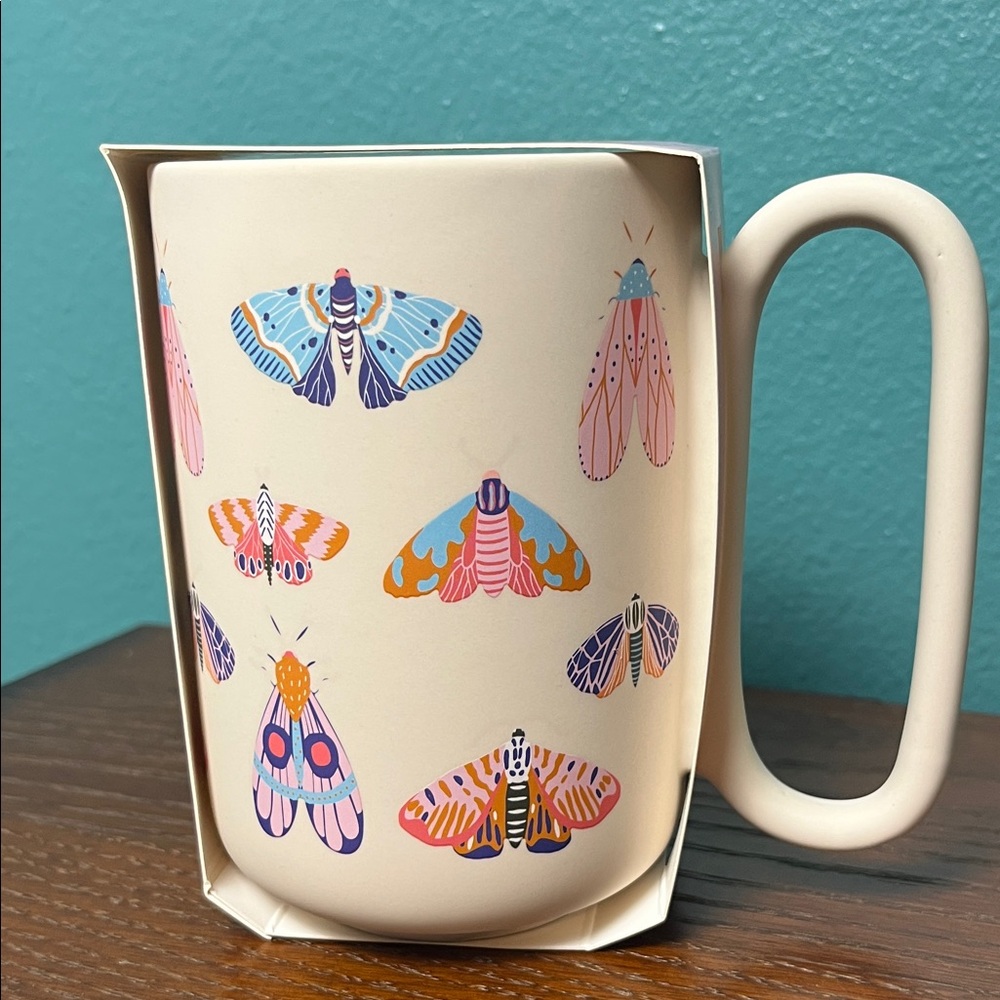 Vibrant Moth Design Mug - Cream